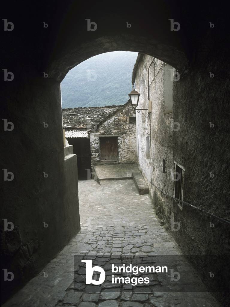 Looking Into Small Cobbled Courtyard in Torla Village in The Pyrenees, Spain. (photo)