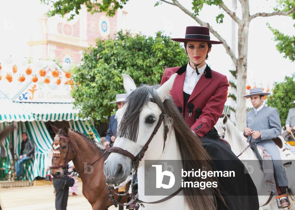 April Feria Festival, Horse Riders in Traditional Dress, Seville, Andalucia, Spain (photo)