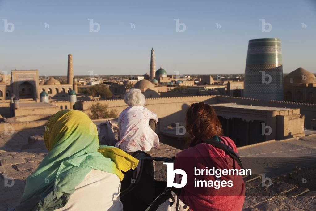View from city walls at sunset, Ichan Kala Old City, Kizilkum desert, Khiva, Khwarezm region, Uzbekistan (photo)