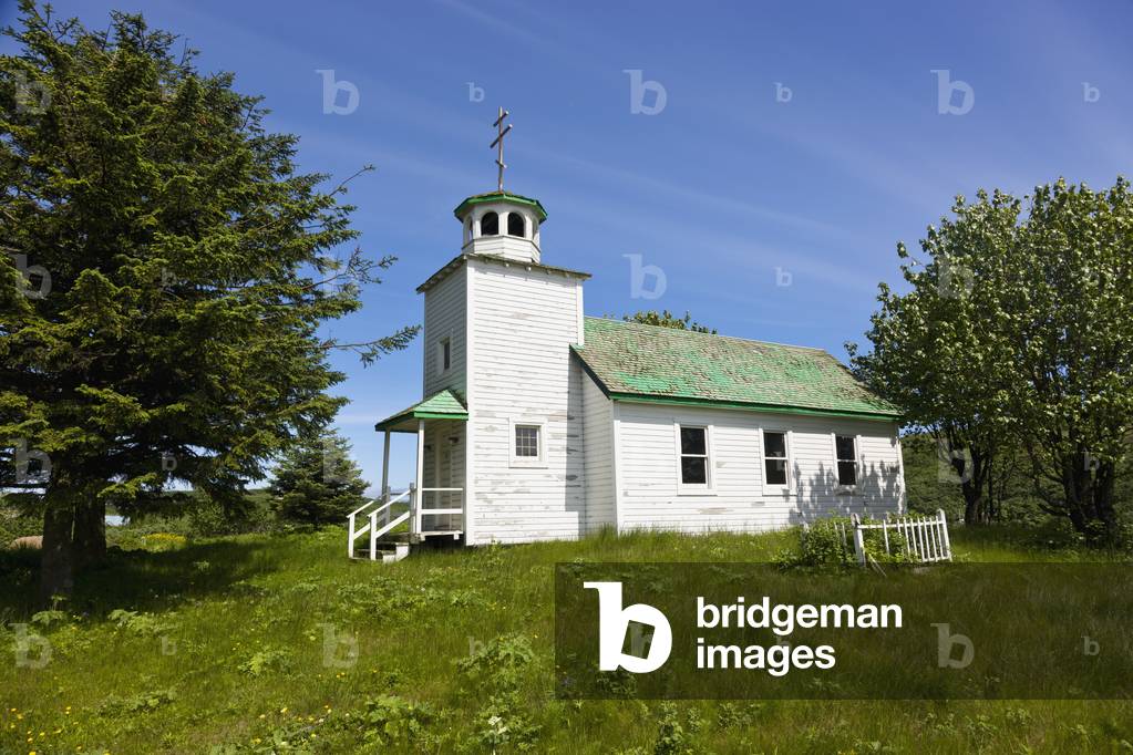 A Russian Orthodox church with a weathered green roof, Sand Point, Popof Island, Southwestern Alaska, USA, Summer (photo)