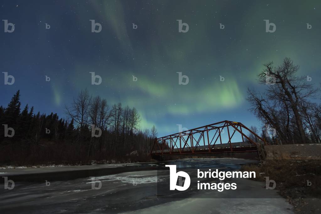View of green Northern Lights above Peters Creek and the Dollar Creek Bridge, Petersville Road, Southcentral Alaska, Autumn (photo)