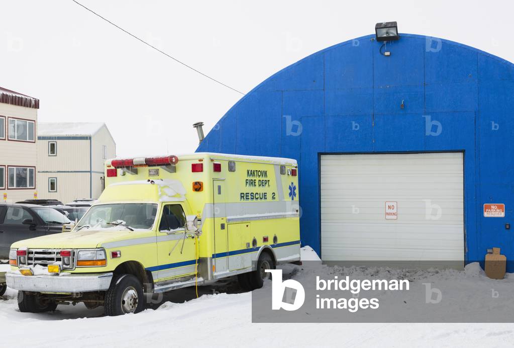 Exterior view of the North Slope Borough Police Department building with an ambulance parked alongside, Barrow, North Slope, Arctic Alaska, USA, Winter (photo)