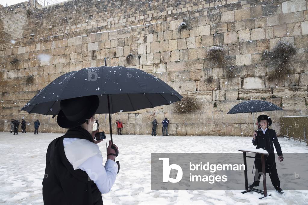 Israel, Western Wall, Jerusalem, 2013, January 10, Tourist photographing friend (photo)