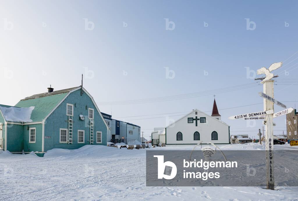 Utqiagvik Presbyterian Church with a whale bone sign in the foreground, Barrow, North Slope, Arctic Alaska, USA, Winter (photo)