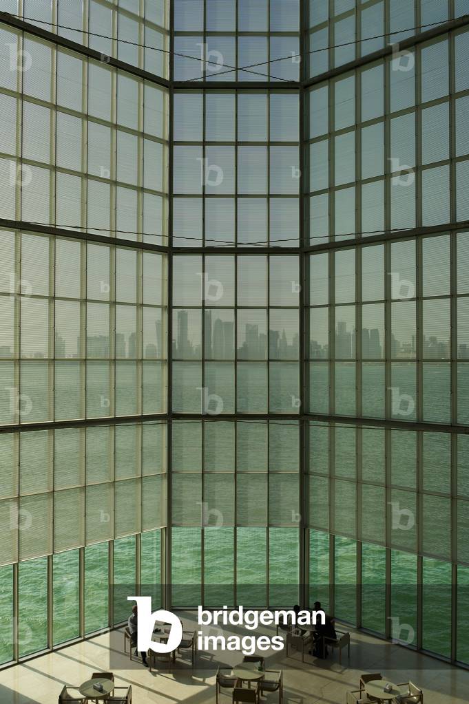 View out of large window in the Museum of Islamic Art to the modern city skyline of Doha, Doha, Qatar (photo)
