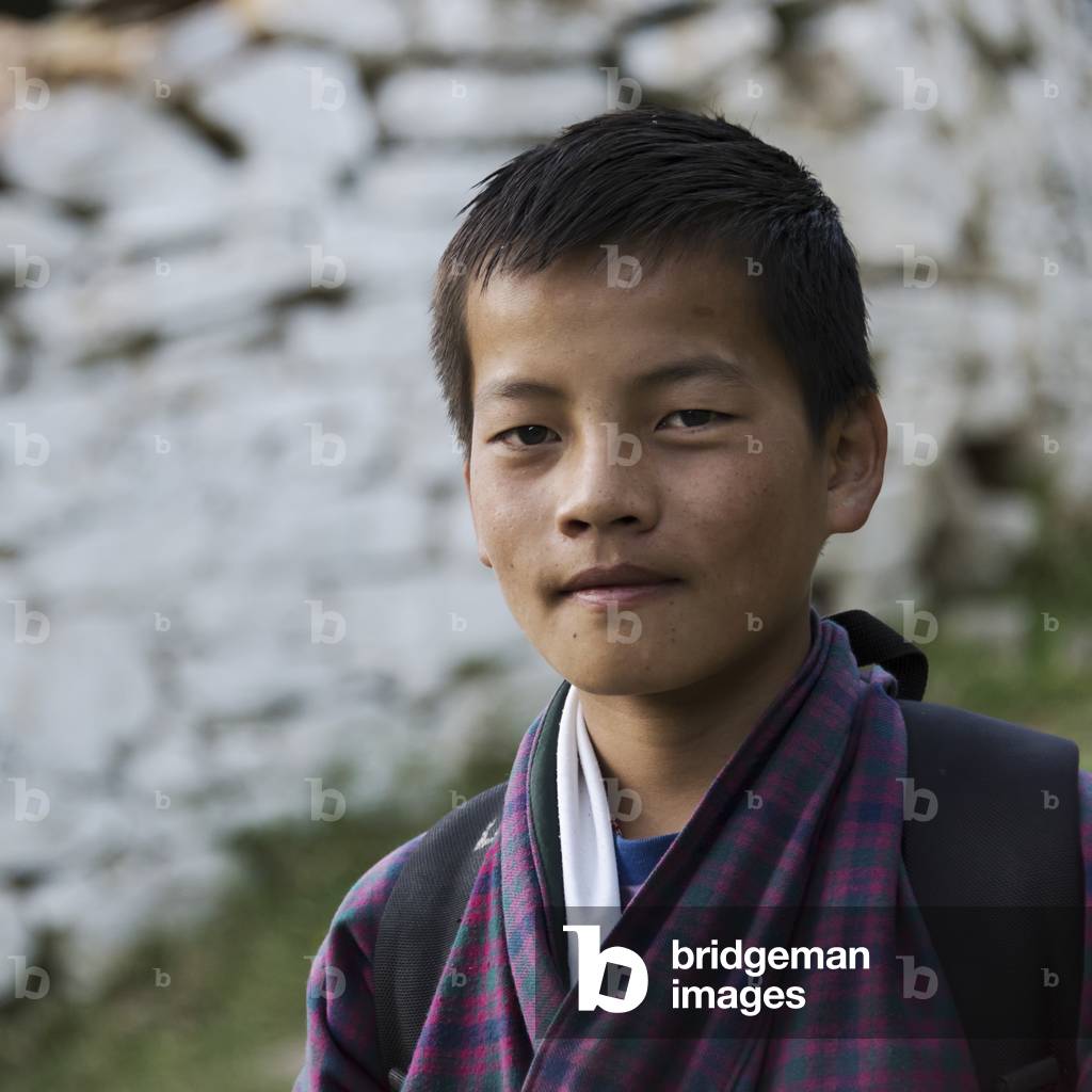 Portrait of a teenage boy, Paro, Bhutan (photo)