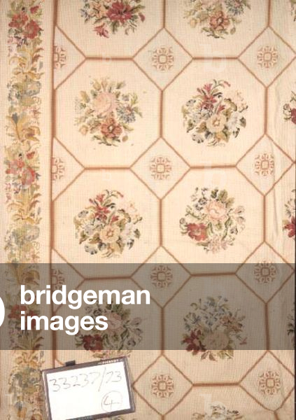 Needlepoint carpet, worked in wool cross stitch, with a repeating pattern of flower sprays in octagonal panels, European, mid 19th century
