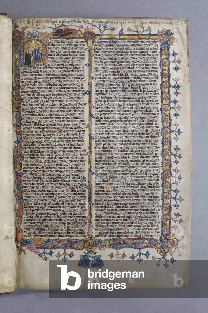 Illuminated full page border with historiated initial 'N' containing a monk kneeling before St Cuthbert, from 'Postilla litteralis in libros historiales Testamenti veteri', by Nicholas of Lyra, c.1386 (vellum)