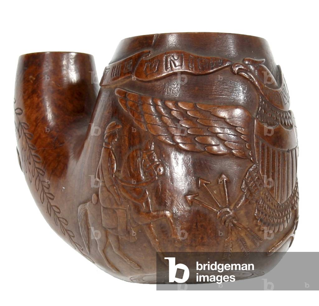Carved wooden pipe with patriotic eagle