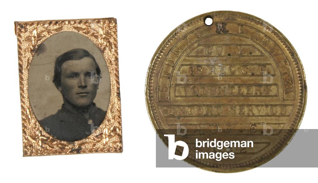 Identity disc of Sidney M Brewster, Company I, 18th Connecticut Volunteers