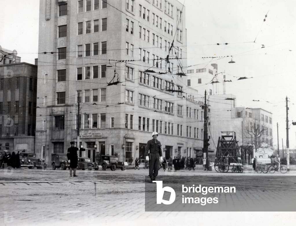 Occupied Japan, 1945 after the surrender. American and Japanese Police - streets of Tokyo