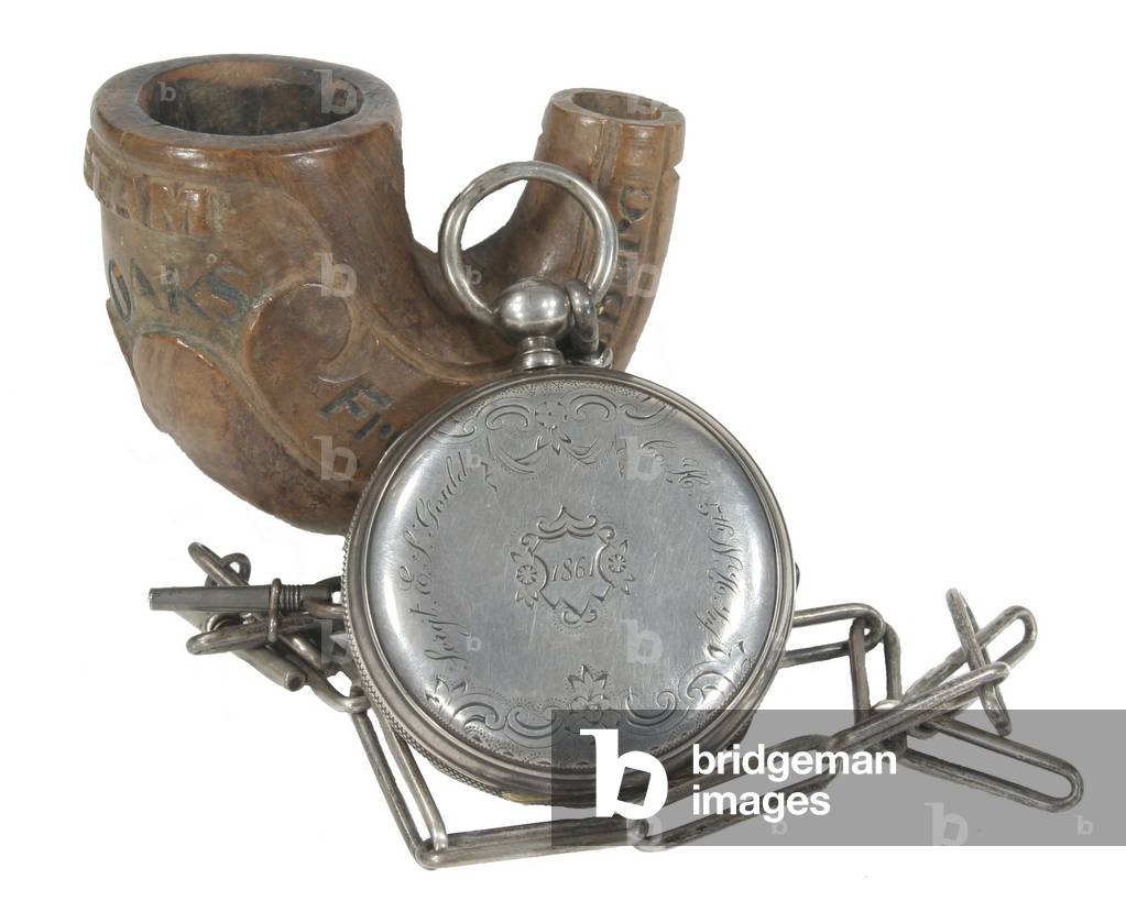 Pipe and silver watch of Sergeant E.S. Gould 5th New Hampshire Volunteers.