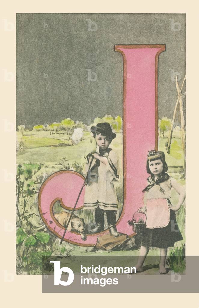 J: Two children, shepherd and shepherd with a dog