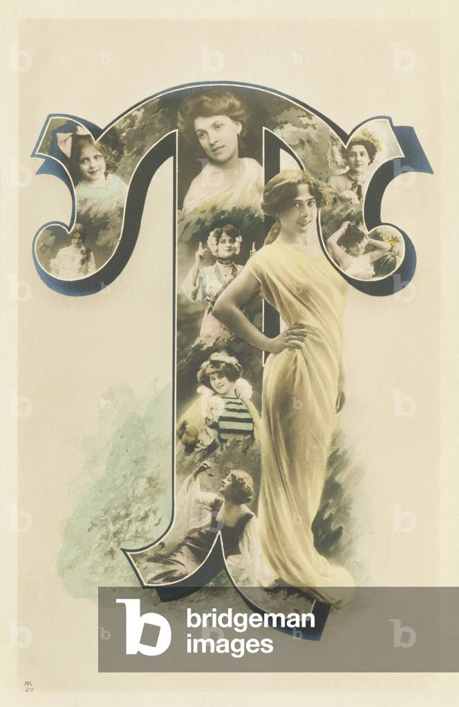 T : photo-portrait of woman standing in a long yellow drape, 1905 (postcard)