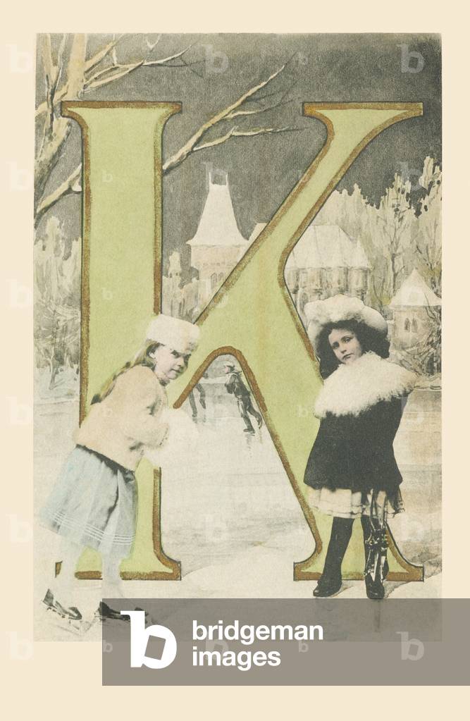 K: Two girls, sliding and ice skating in winter