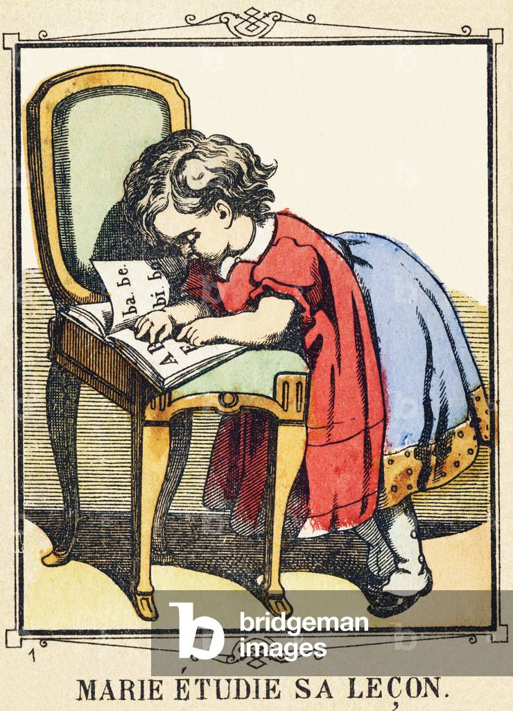 Marie studies her lesson. In 