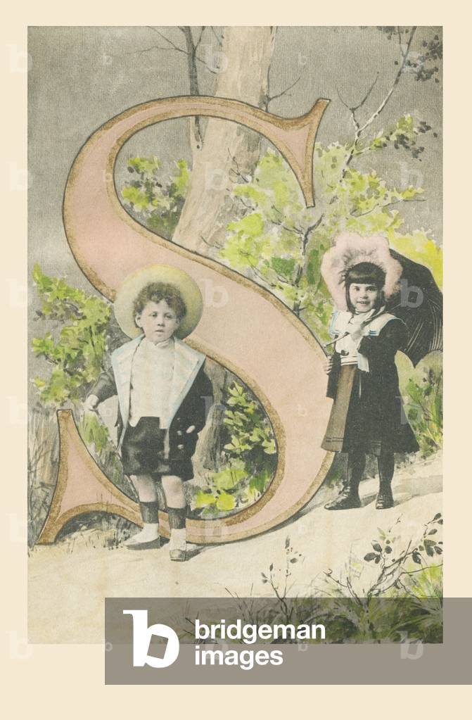 S: A boy holding a stick, a girl with an umbrella