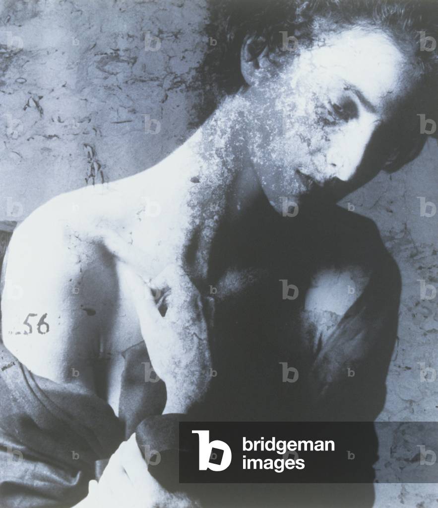 Pensive woman posing in studio