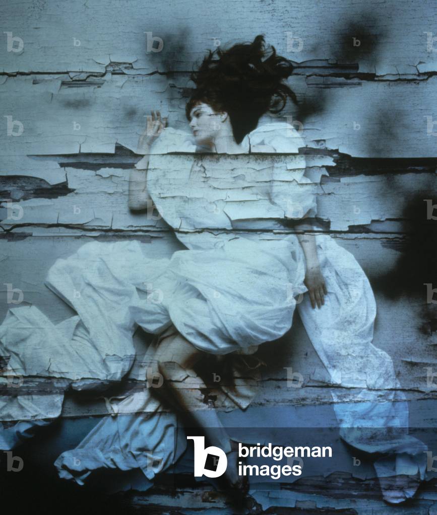 Woman Wrapped in White Sheet