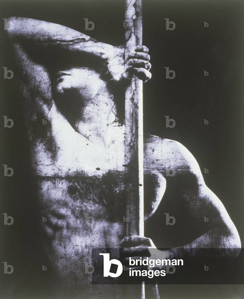 Semi dress man holding stick