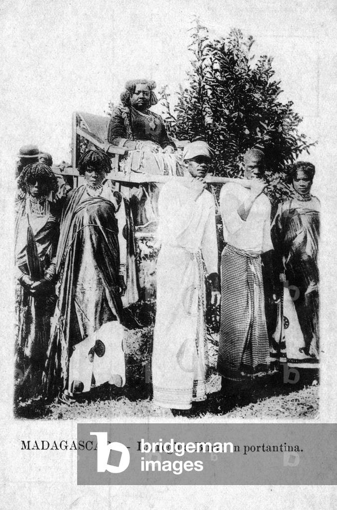 Queen Binao of Madagascar (1879-1921/1923) on a wheelchair.