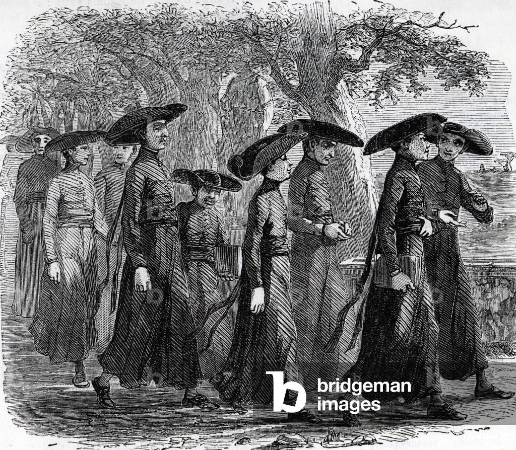 Students of the missionary college of Propaganda Fide (Propaganda or Pontifical Urbanian University) Institute of Higher Studies of the Catholic Church specializes in the formation of missionary clergy based in Rome (Students of Pontifical Urban University also called the Urbaniana in Rome) Engraving from “Illustrous Universe” 1862 Private collection