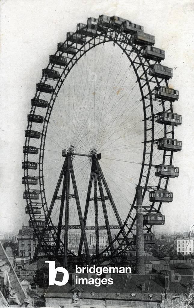 View of the Ferris Wheel Avenue de Suffren built for the exhibition universal in paris in 1900 (View of the Grande Roule de Paris at 100-metre (328 ft) tall Ferris wheel built in 1900 for the Exposition Universelle world exhibition at Paris) Postcard 1905 - 1910 Collection privee