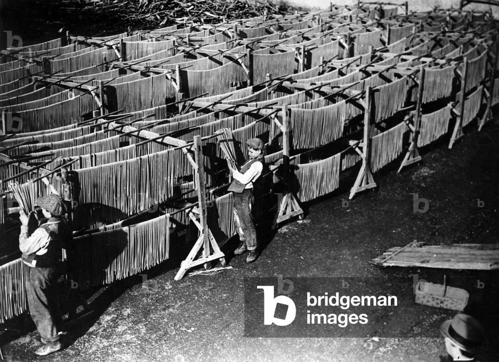 Image of Photography depicting DRYING MACARONI 1930 by Barnaby's Studios Ltd