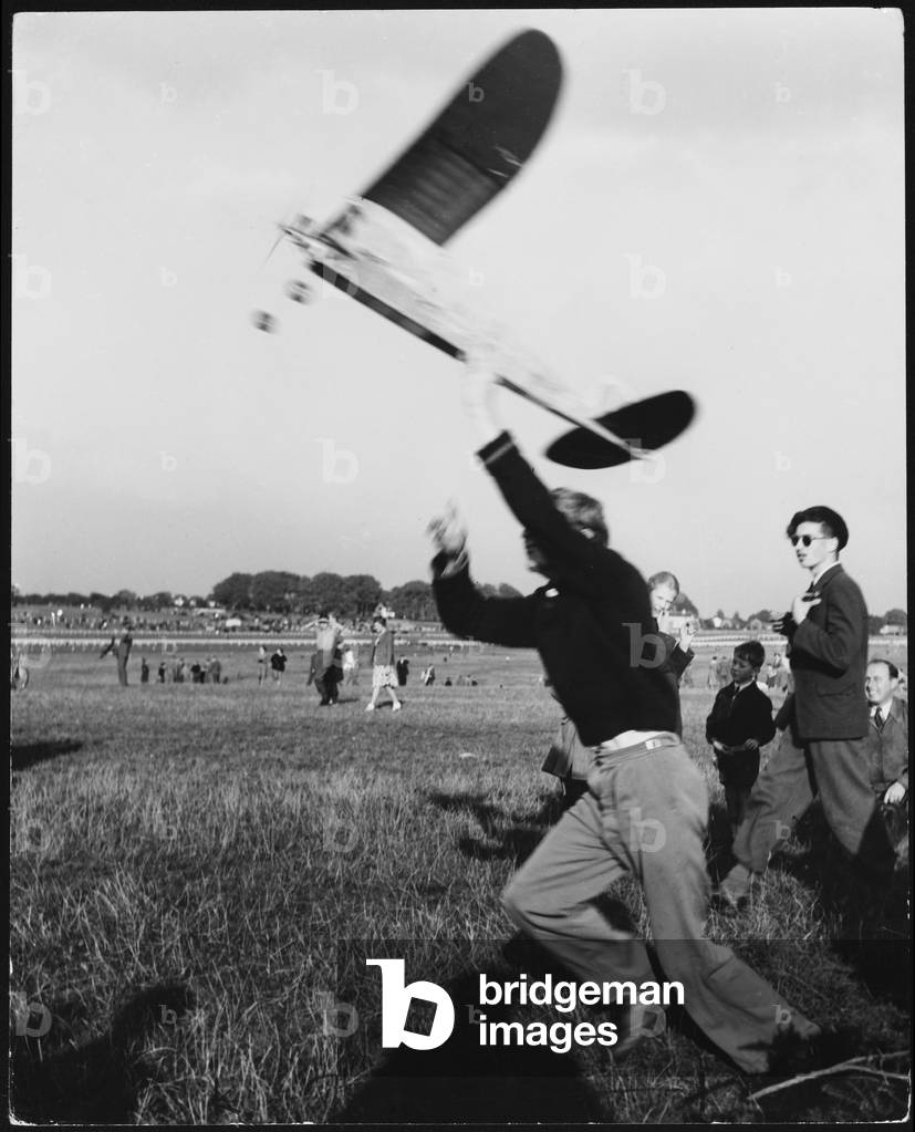 Image of Photography depicting RUNNING WITH MODEL PLANE 1950 by Barnaby's Studios Ltd
