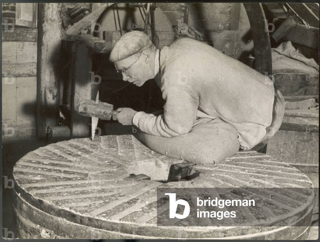 DRESSING A MILLSTONE