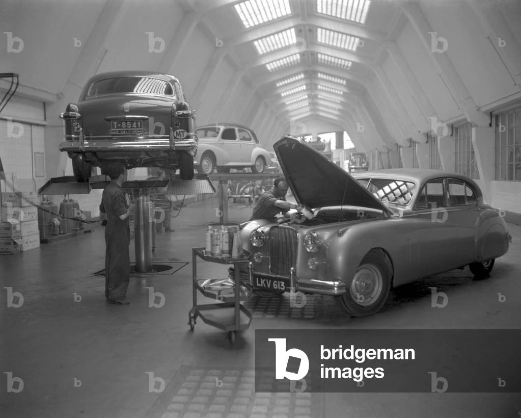 Inside the machine shop at the Autorimessa Piazzale Roma, Venice, Italy, circa 1950 : Mechanics