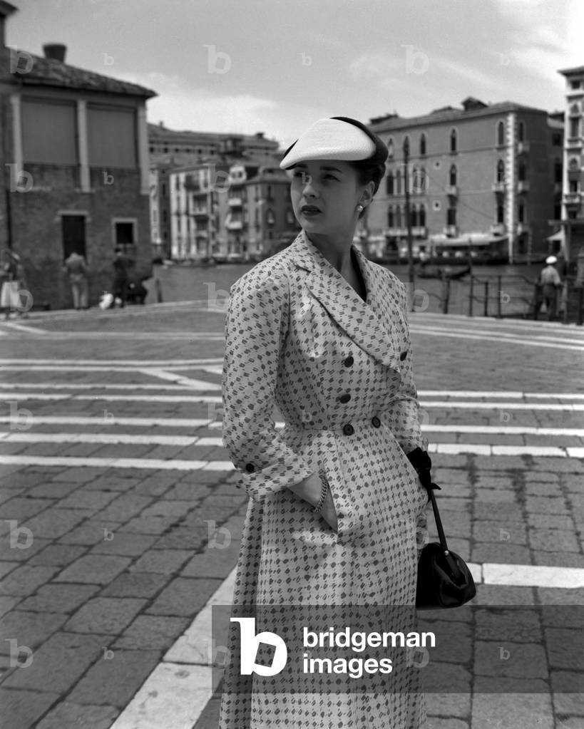 A model wearing Christian Dior fashions in Venice, 3rd June 1951 : Fancy Fabric