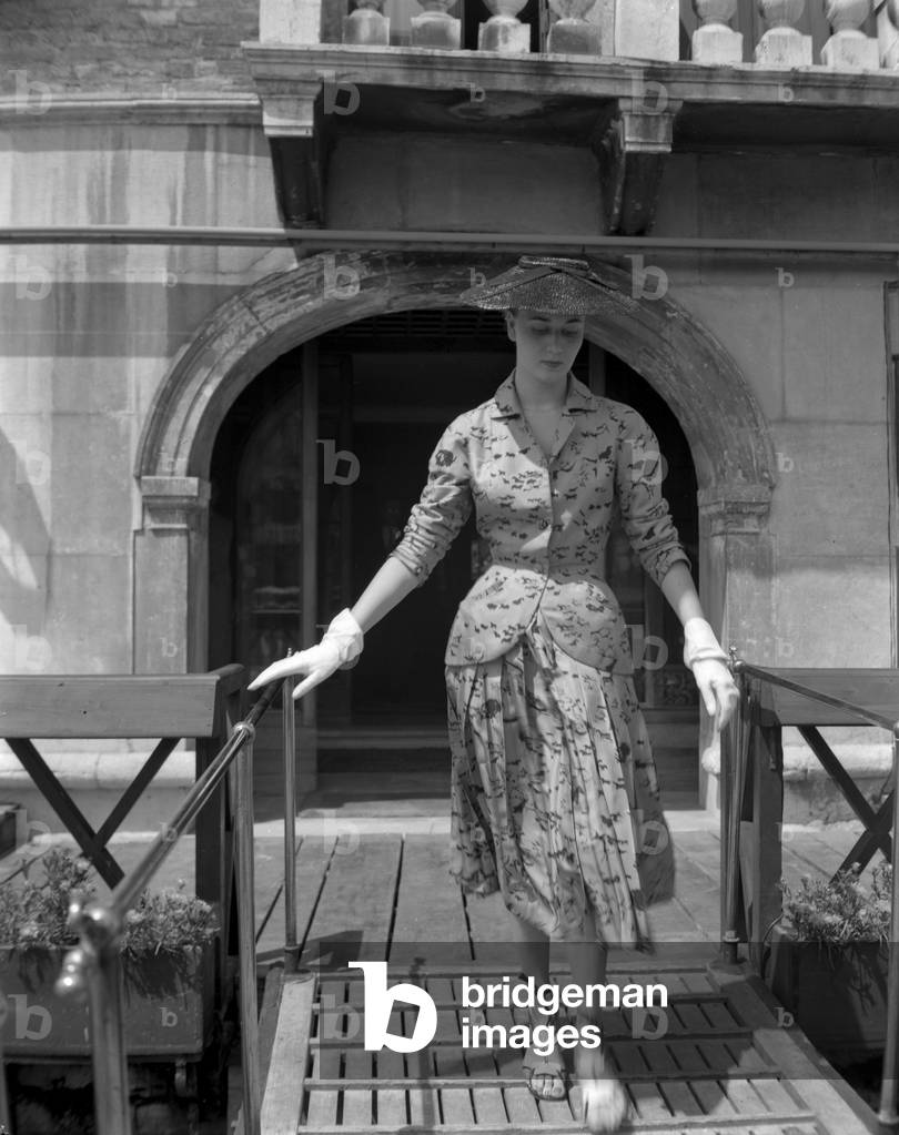 A model wearing Christian Dior fashions outside the Gritti Palace hotel in Venice, 3rd June 1951 : White Gloves