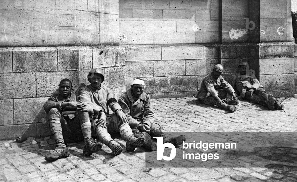 French prisoners (among them 2 Senegalese Tirailleurs) in Sissonne, France, 1917 (b/w photo)