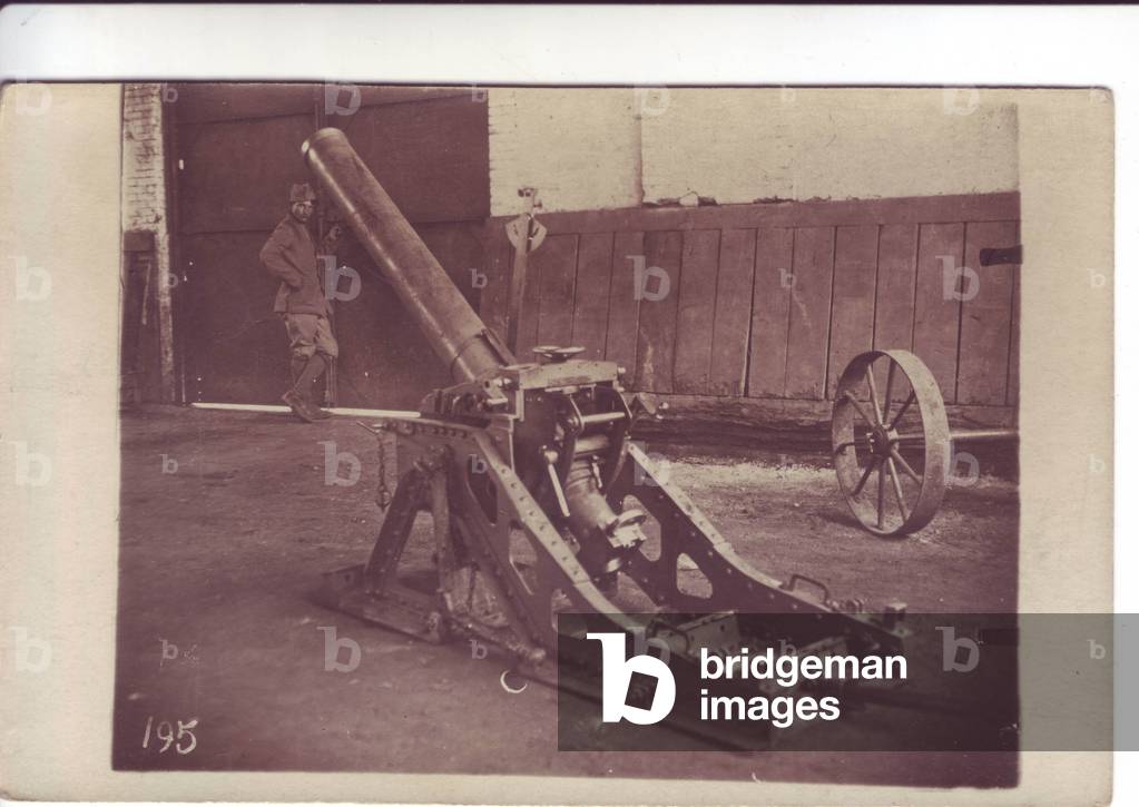 German trench cannon captures and exposes in a farm yard