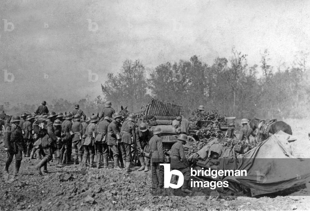 German artillery convoy mired in mud, ww1 (b/w photo)