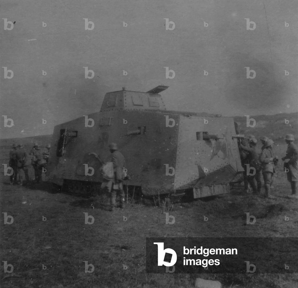 1918- a German tank A7V, surrounds with part of its crew