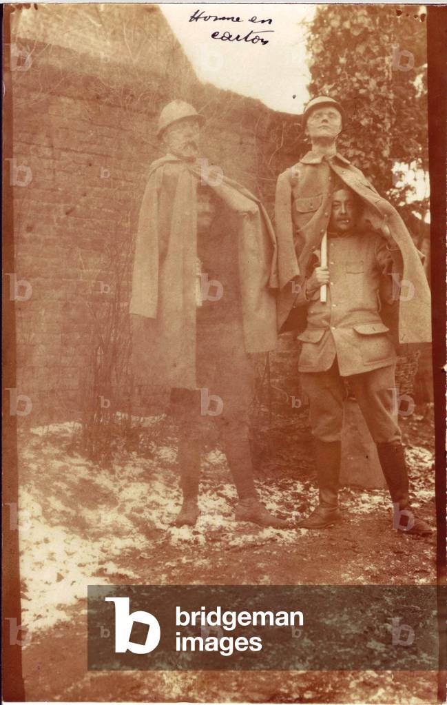 French soldiers wearing cardboard leures, depicting French fighters.