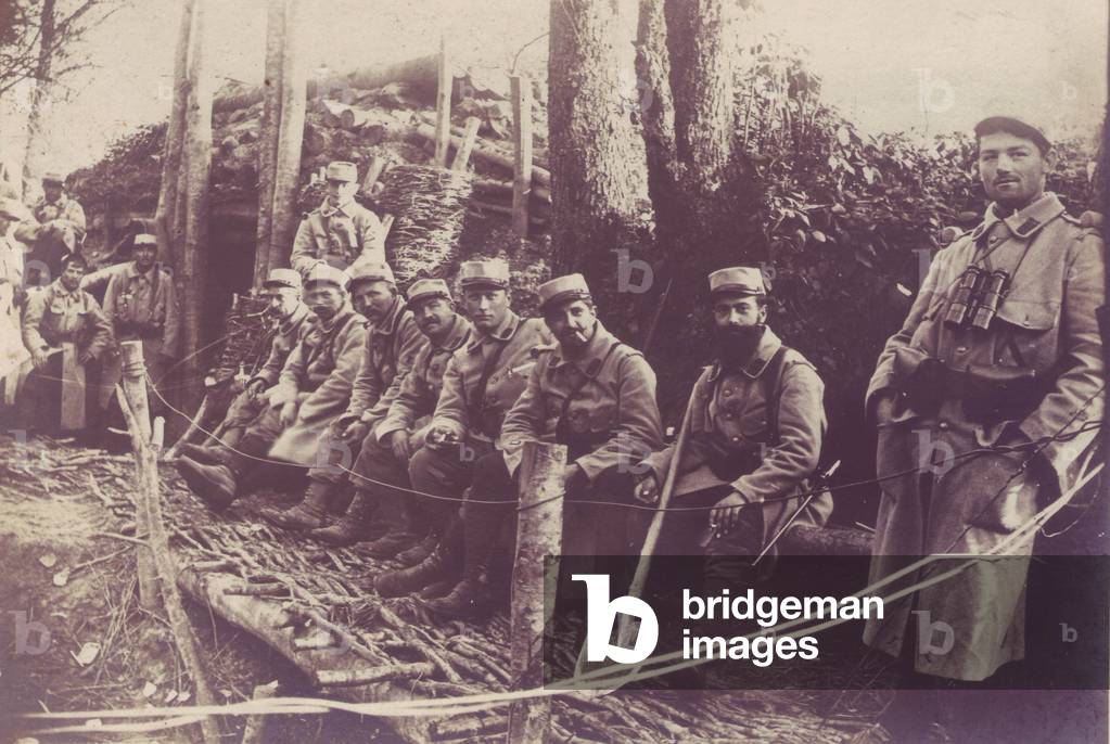 235th Regiment of Infantry Soldiers posing on the latrines they dug 1915 front of Alsace Burnhaupt