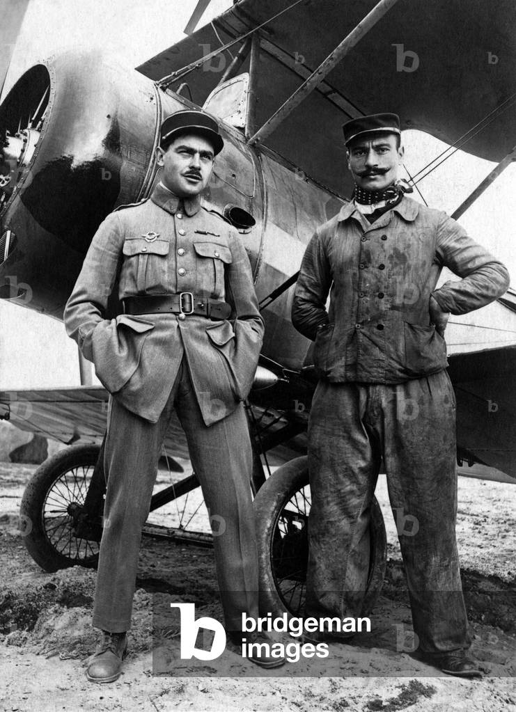 A pilot and his mechanic posing in front of a plane, 1918 in Romorantin, France