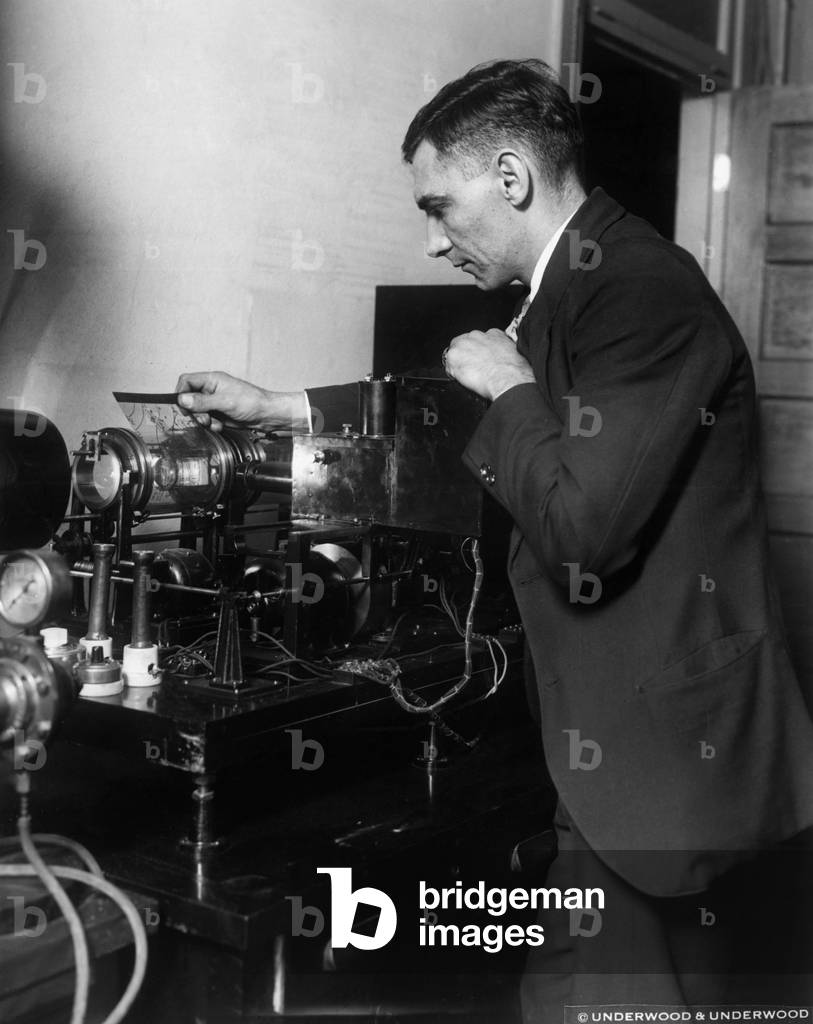 Washington DC, USA, November 19, 1928: Chief Radio F. Doulong tests the transmission of meteorological maps at USS Texas (BB-35) at sea - Washington DC, USA, 19th November 1928: Navy chief radio man, F Doulong, tests new devices to broadcast weather maps to ships at sea