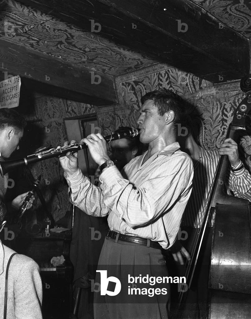 Clarinetist Claude Luter (1923-2006) in a club in Paris around 1950