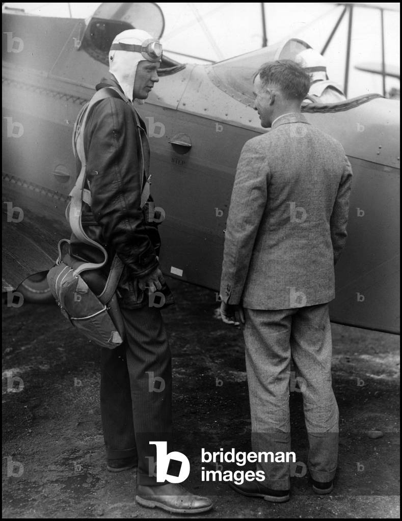 Roosevelt Field (Long Island) USA June 1929: Colonel Charles Lindbergh (1902-1974) accompanies his wife Anne Spencer Morrow for an inspection tour of the TAT (Transcontinental Air Transport) air line that connects the East Coast to the West Coast of the USA