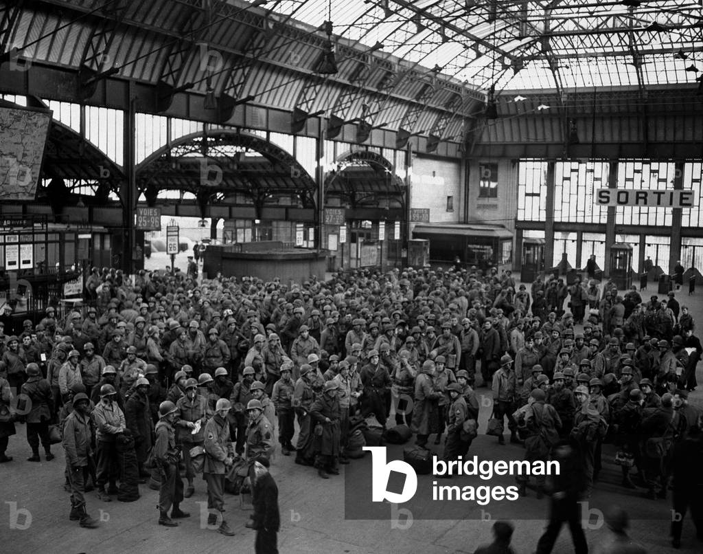 WWII:Paris (France) April 1945: At the Gare de l'Est, 3rd US Armee permissionaries including many African Americans