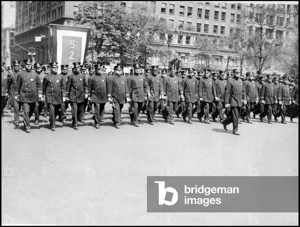 New York City (NY) USA May 11, 1918: At the annual Police Parade, the Police Department Service Flag with 252 stars is in the lead