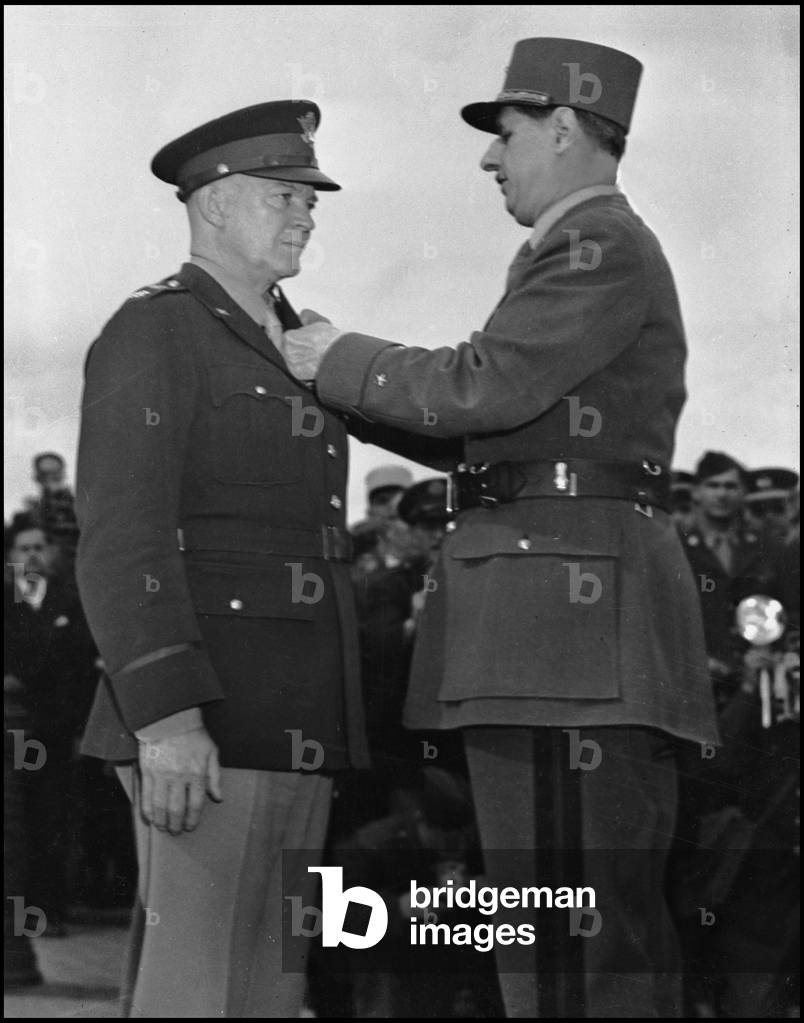 Second World War (1939-1945): Paris (France) 14 June 1945. During a ceremony at the Arc de Triomphe, General Charles de Gaulle decorates General Dwight Eisenhower, Supreme Commander of the Allied Forces in Europe, of the Medaille de la Liberation. Photography