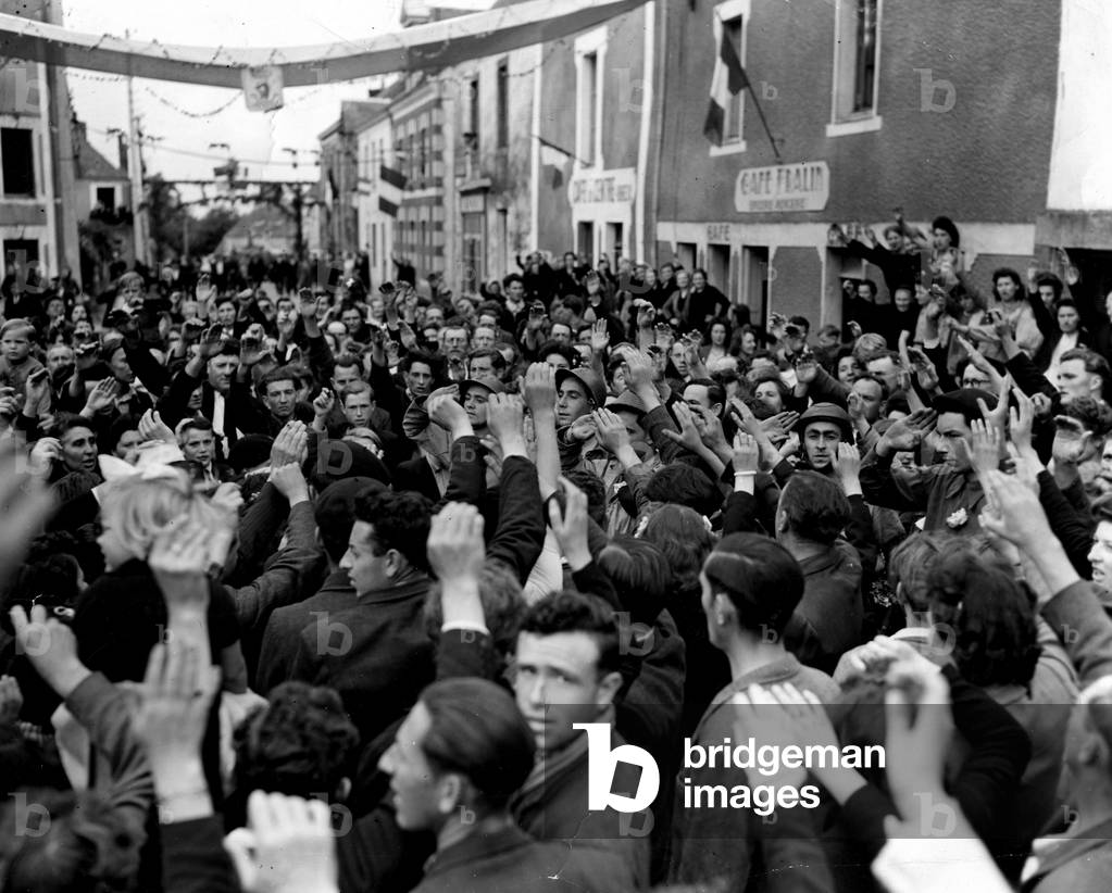 WWII:St Nazaire (France) May 10, 1945: After the surrender of the German garrison and the entry of soldiers from the 66th US DI of General Kramer and the 8th French DI of General Chomel and the FFI battalions of Nantes, the inhabitants manifest their joy of being finally liberated.