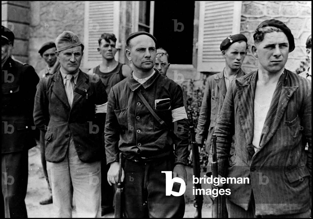 Second World War (1939-1945): First Resistant Training Camp in Brittany, August 1944. Here, a group of fighters while taking arms.
