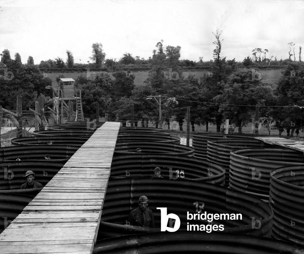 WWII:Normandy (France) May 30, 1945: In this camp of prisoners of war, recalcitrant German officers were enclosed in veritable open-air containment cells.