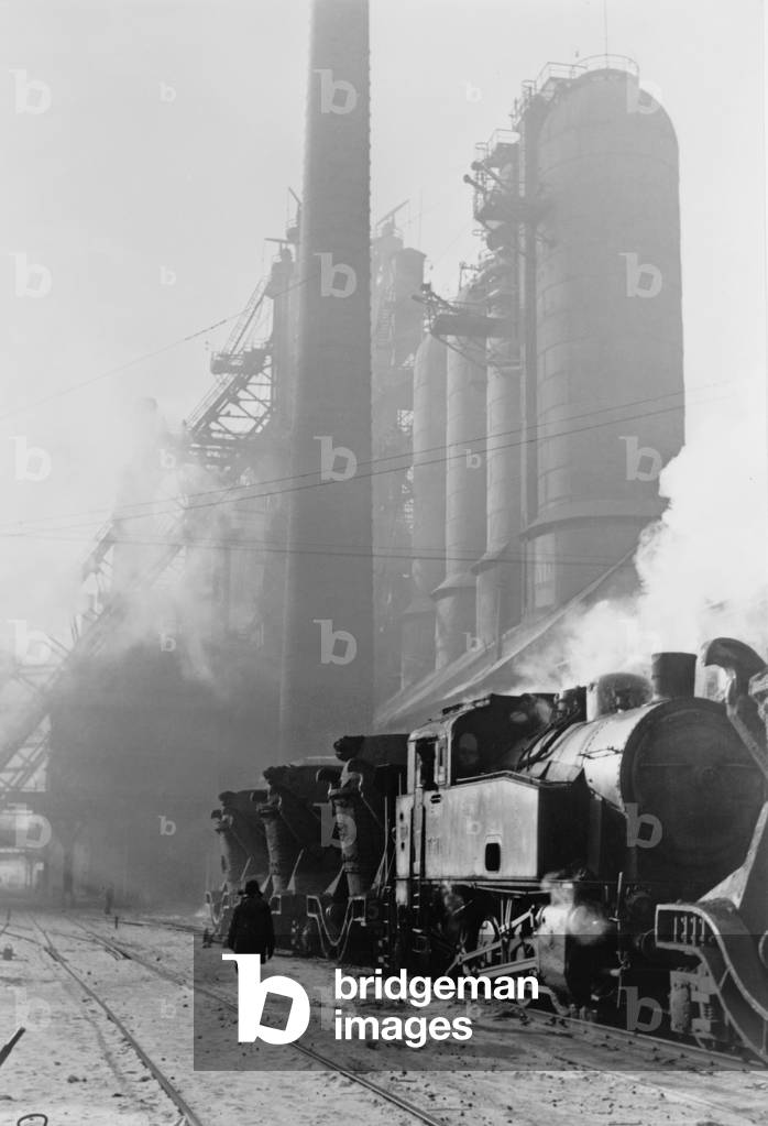 Locomotive hauling pig iron at the blast-furnace of the Stalin Metallurgical Works. Kuznetsk, Russia, 1955. - (BSLOC_2014_15_256): Locomotive hauling pig iron at the blast-furnace of the Stalin Metallurgical Works. Kuznetsk, Russia, 1955. - (BSLOC_2014_15_256)